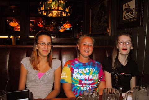 addie, my cousin megan. and me.. it was a pic that i didn't even know my uncle ken was taking. where at Ruby Tuesday's. i look so weird in this pic.. go ahead and laugh.. i'll have better one's really soon.